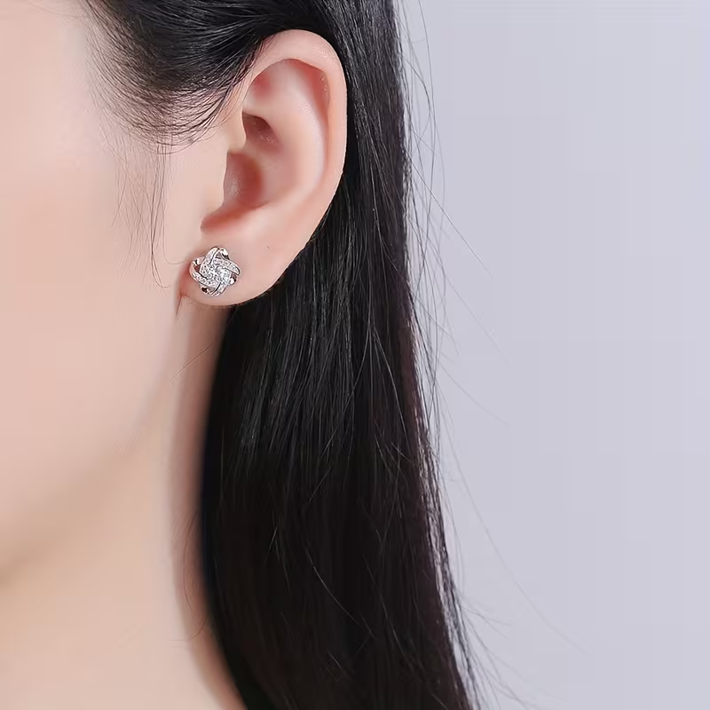 Twisted Orbit Silver Earrings