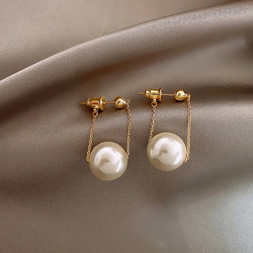 Dangling Pearl Gold Earrings