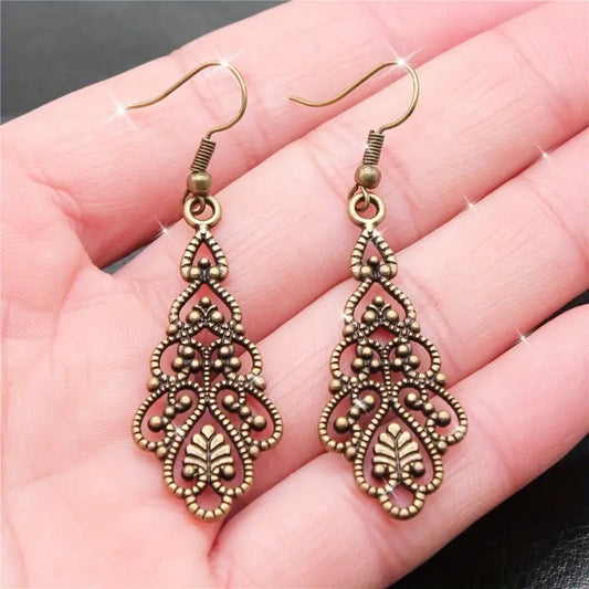 Dangling Gold Mandala Earrings