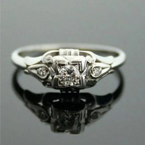 Rounded Inlaid Zirconia Silvered Ring