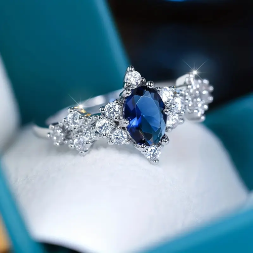 Bright Oval Blue Crystal Silvered Ring